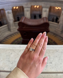 Brooklyn’s hand with the ring, Napoleon’s tomb below